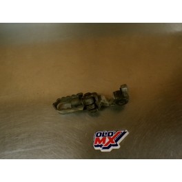 Cale pied + support gauche Honda 125 XLS